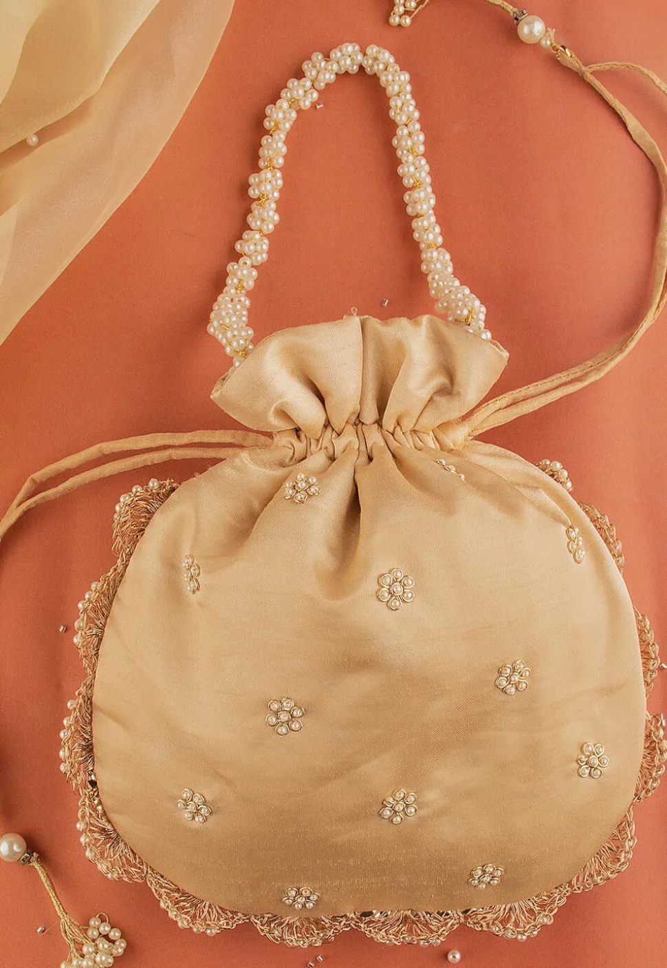 Hand Embroidered Art Silk Potli Bag in Beige
