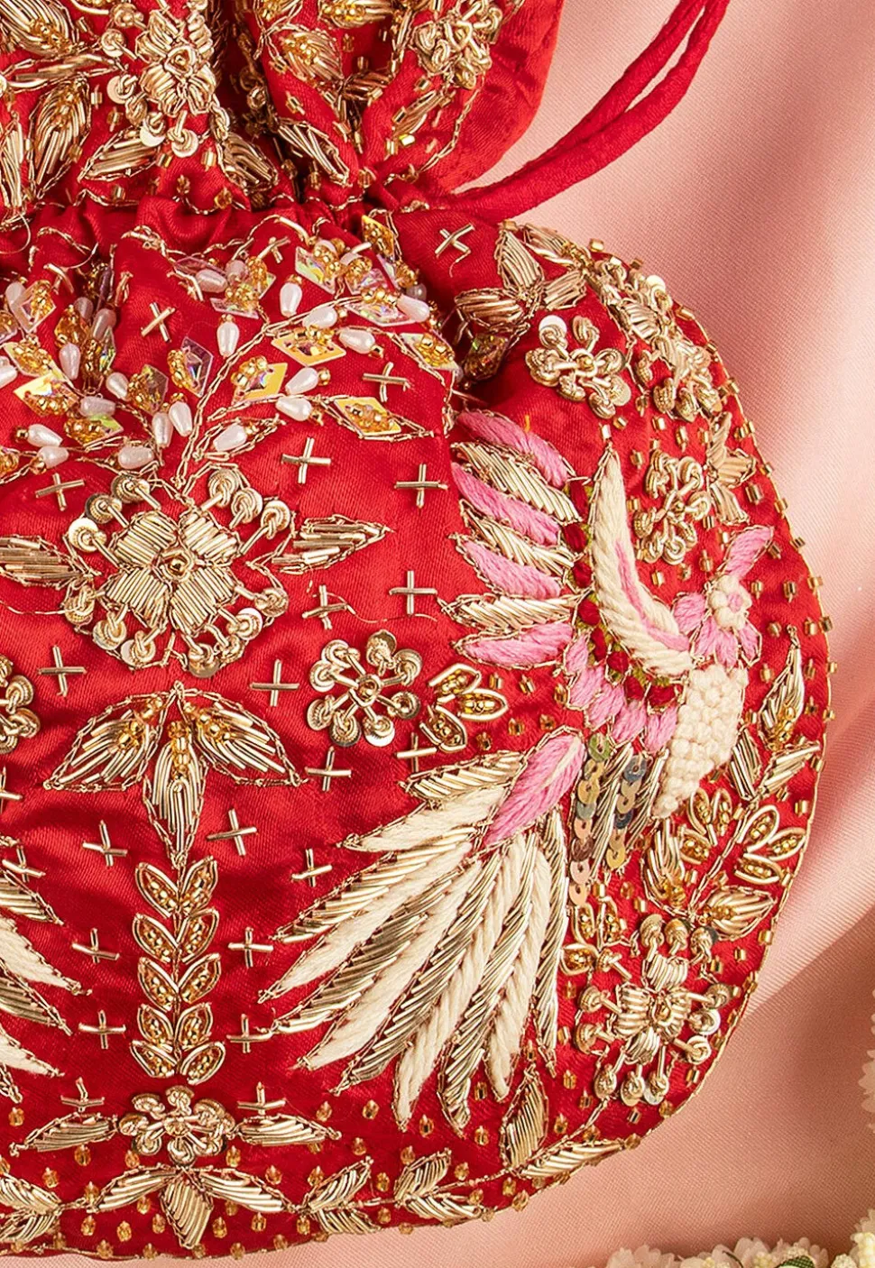 Hand Embroidered Art Silk Potli Bag in Red