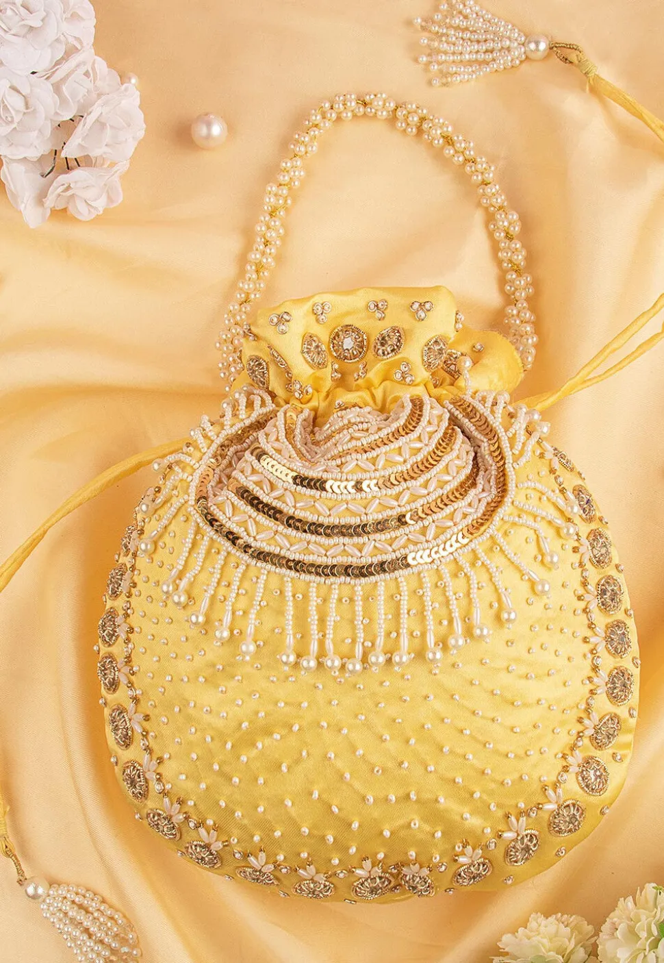 Hand Embroidered Art Silk Potli Bag in Pastel Yellow
