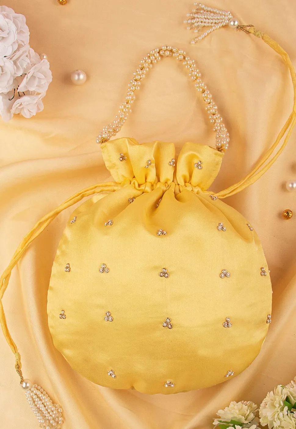 Hand Embroidered Art Silk Potli Bag in Pastel Yellow