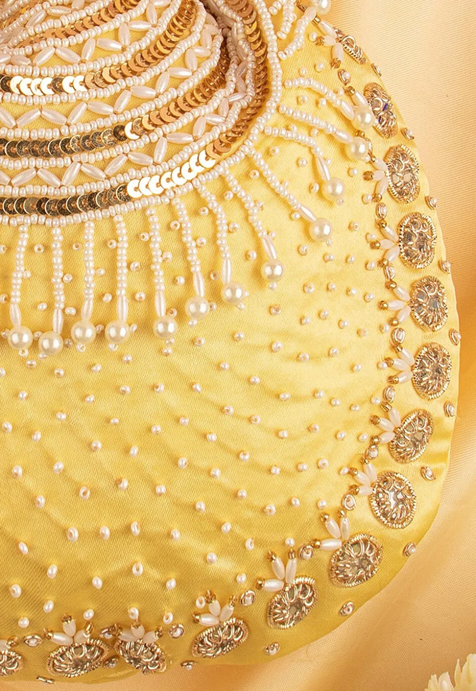 Hand Embroidered Art Silk Potli Bag in Pastel Yellow