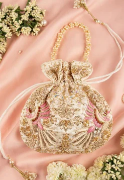 Hand Embroidered Art Silk Potli Bag in Off White