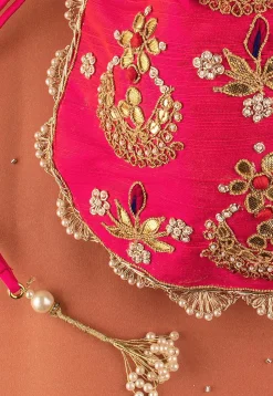 Hand Embroidered Art Silk Potli Bag in Fuchsia
