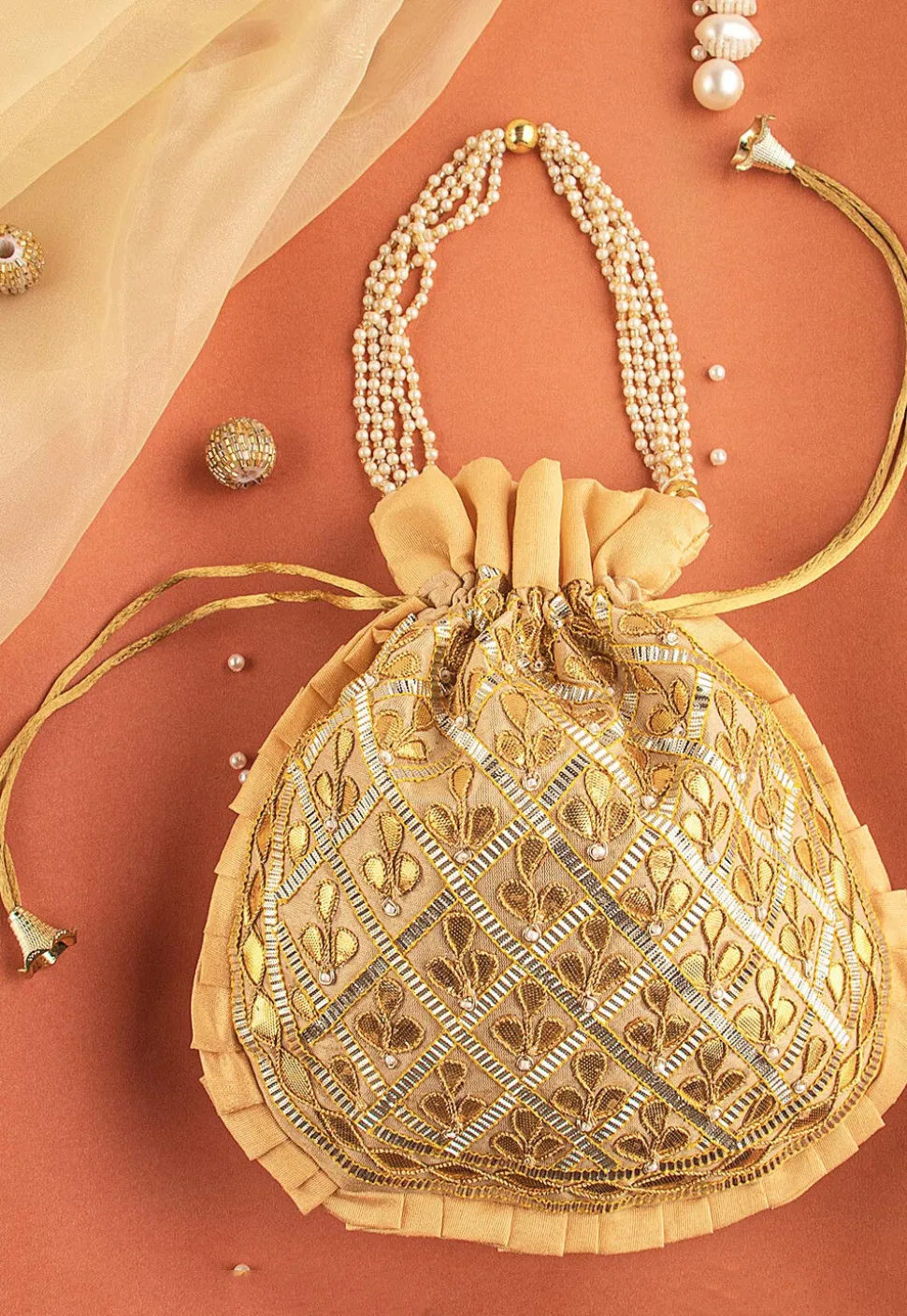 Hand Embroidered Art Silk Potli Bag in Beige