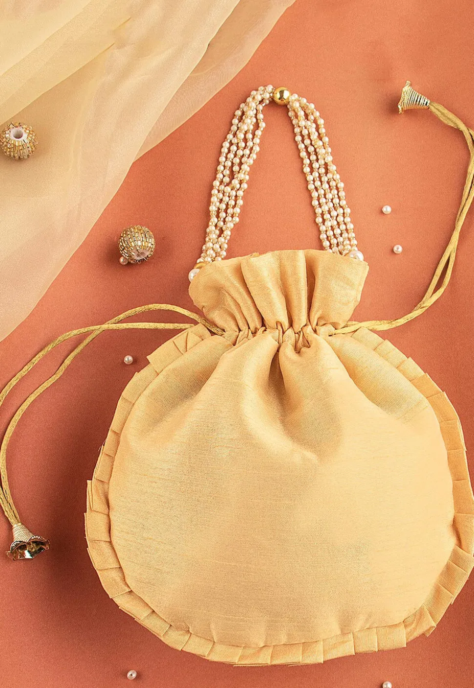 Hand Embroidered Art Silk Potli Bag in Beige
