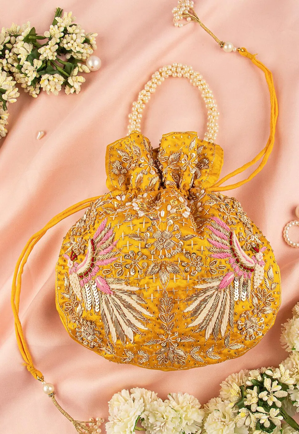 Hand Embroidered Art Silk Potli Bag in Yellow