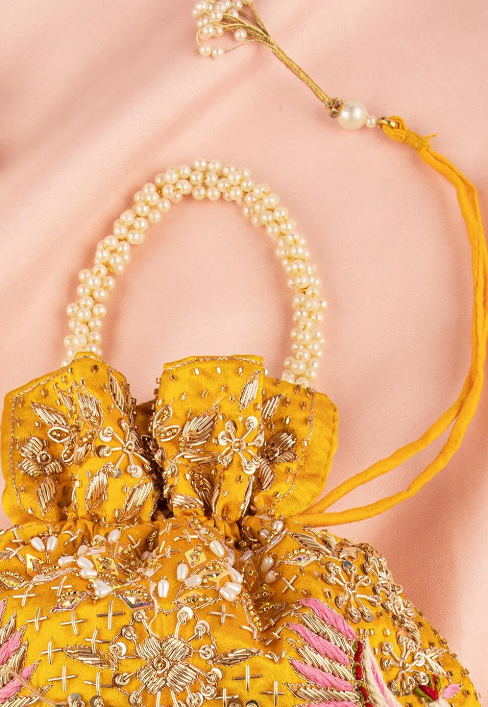 Hand Embroidered Art Silk Potli Bag in Yellow