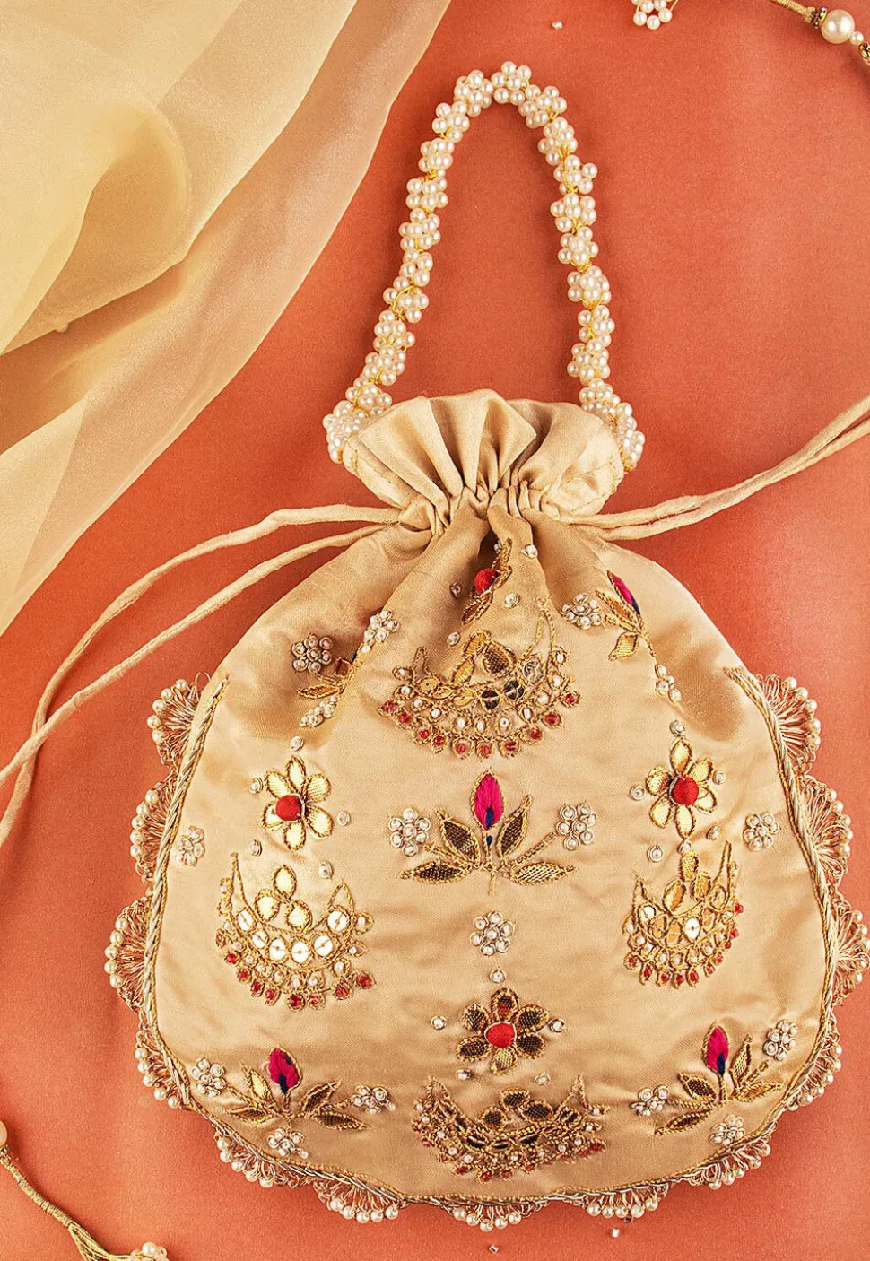 Hand Embroidered Art Silk Potli Bag in Beige