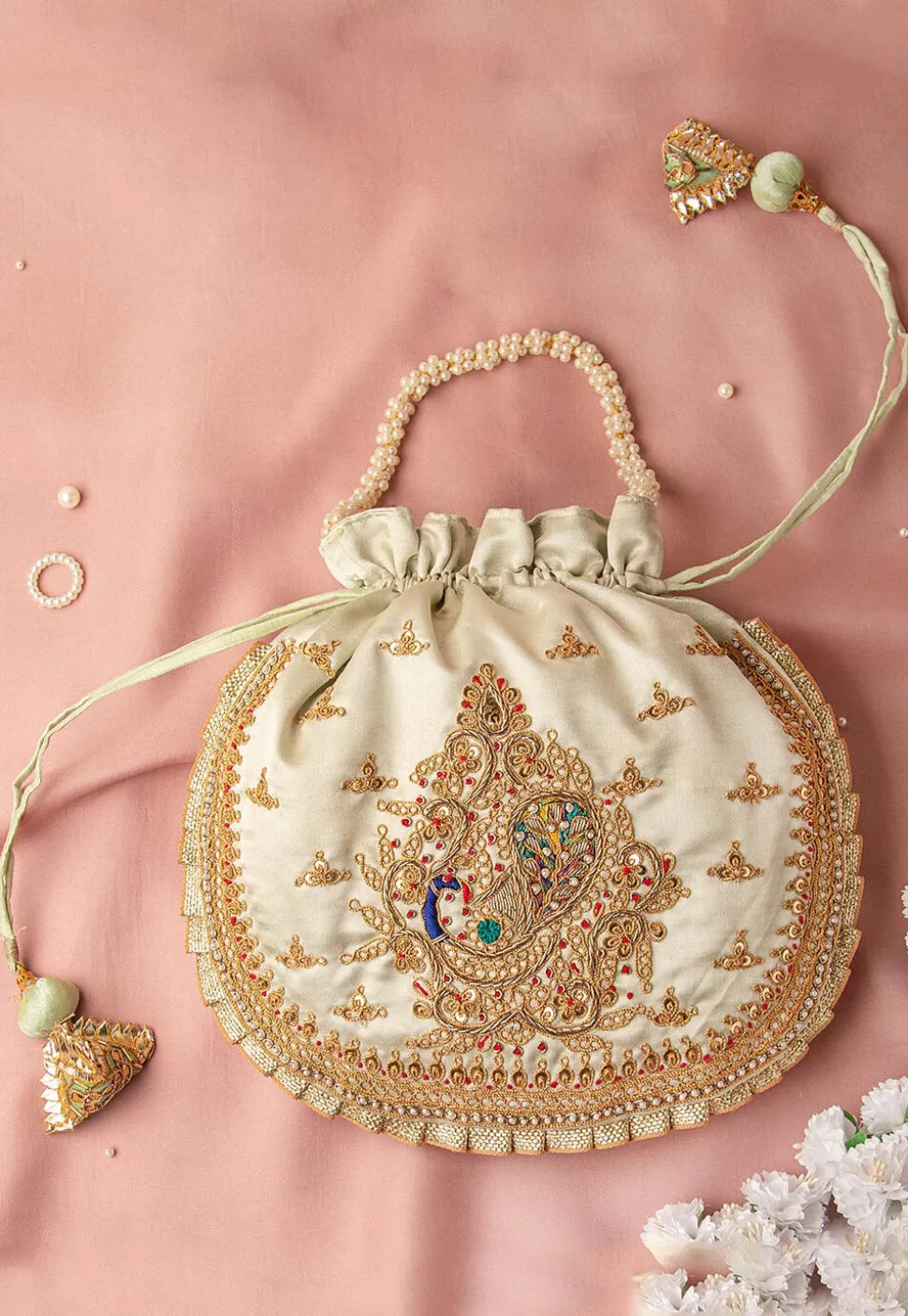 Hand Embroidered Art Silk Potli Bag in Pastel Green