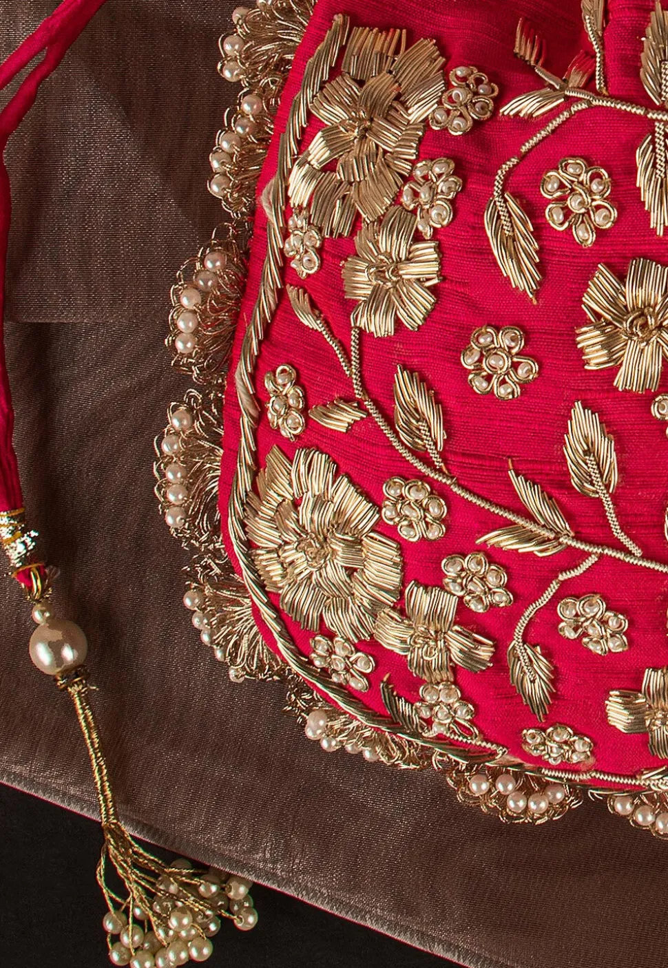 Hand Embroidered Art Silk Potli Bag in Red