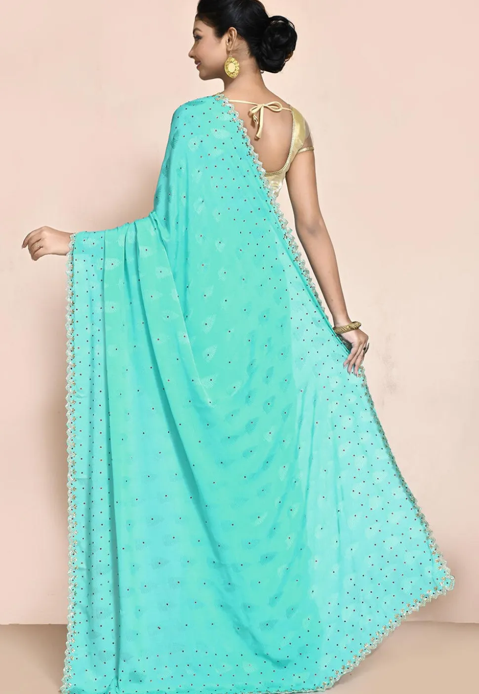 Hand Embroidered Chiffon Jacquard Saree in Turquoise