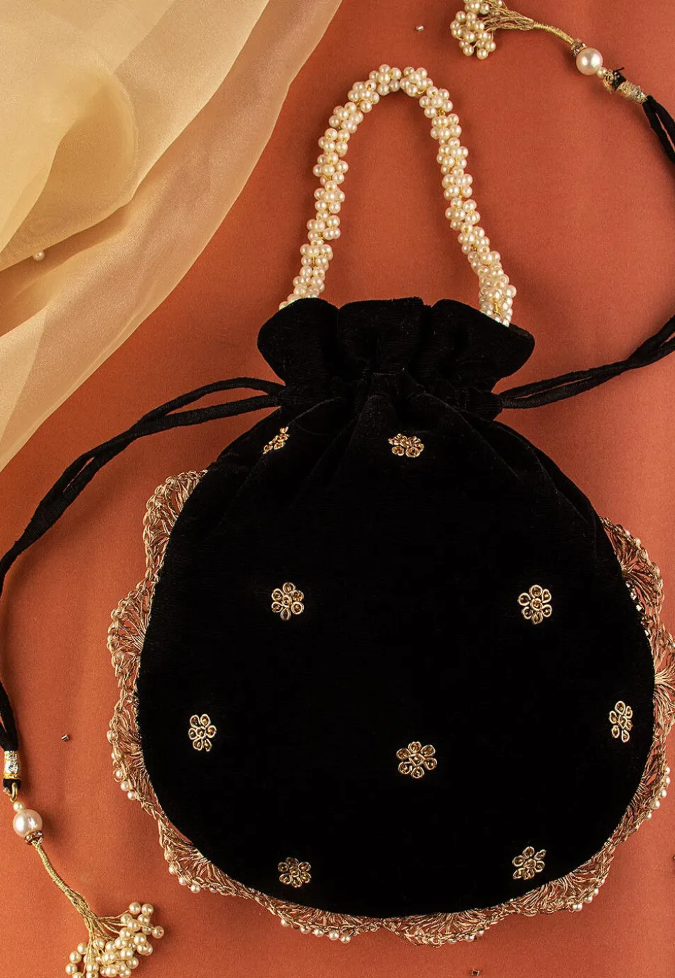 Hand Embroidered Velvet Potli Bag in Black