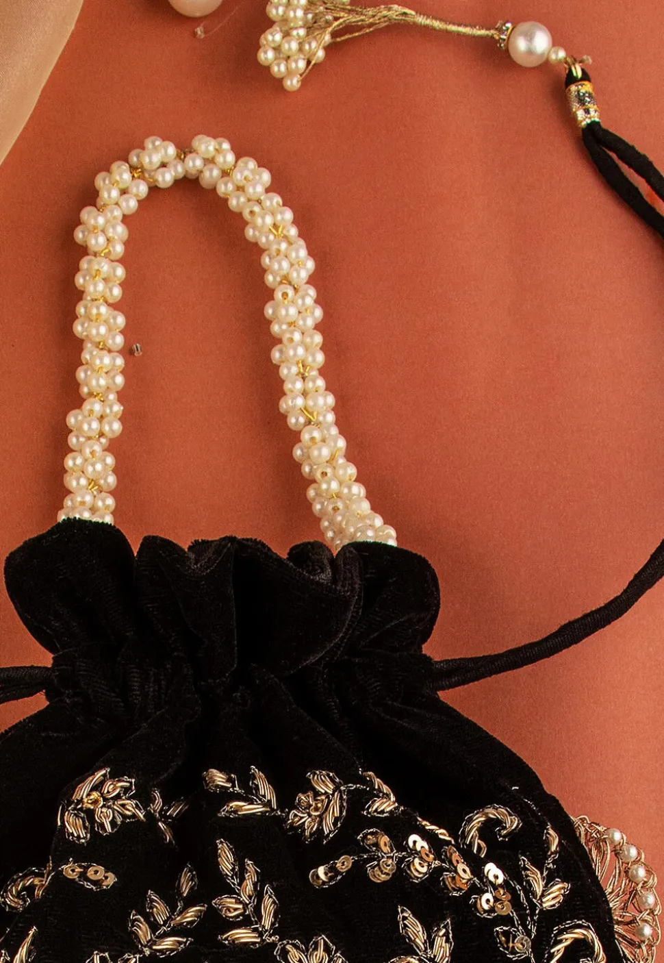 Hand Embroidered Velvet Potli Bag in Black