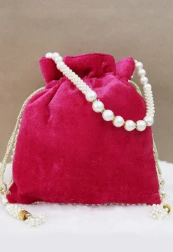 Hand Embroidered Velvet Potli Bag in Fuchsia