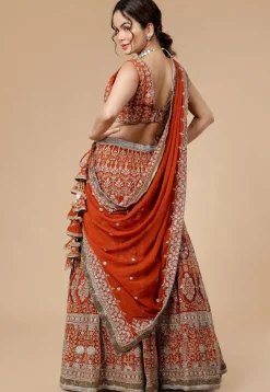 Hand Embroidered Viscose Georgette Lehenga in Rust