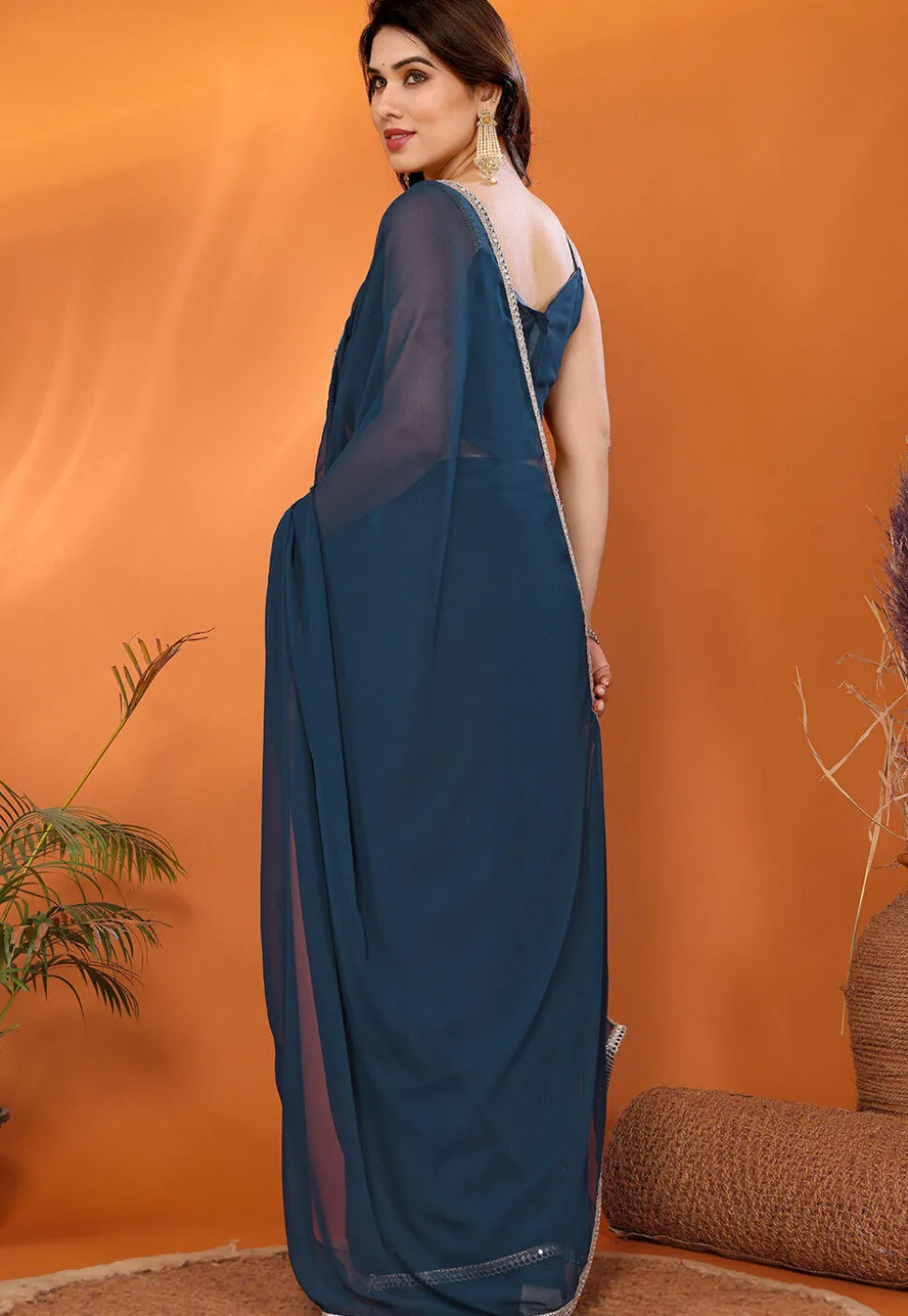 Lace Embellished Georgette Saree in Teal Blue