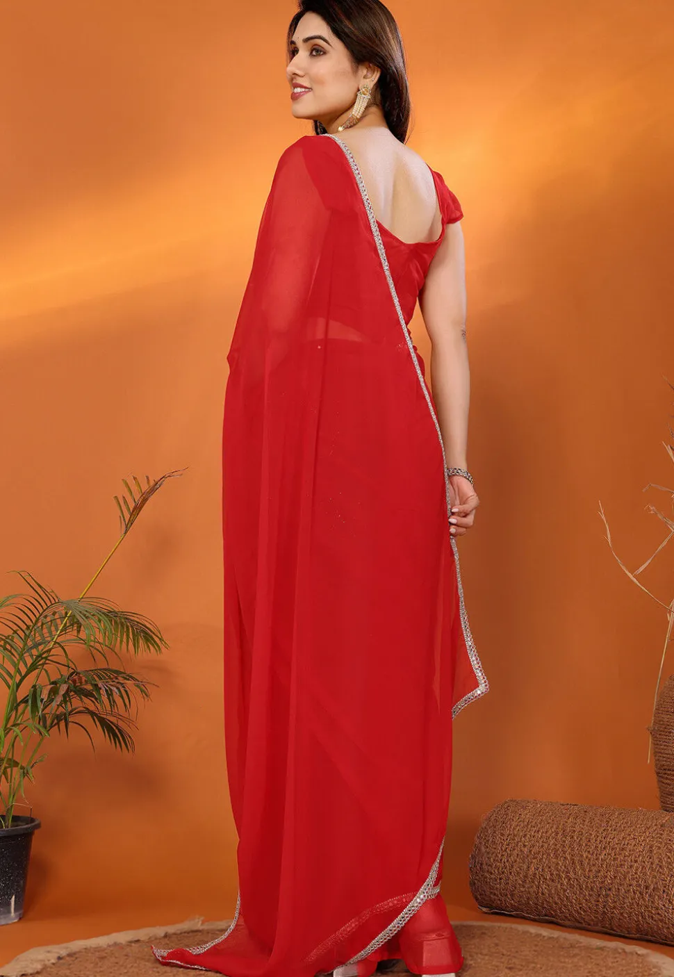 Lace Embellished Georgette Saree in Red