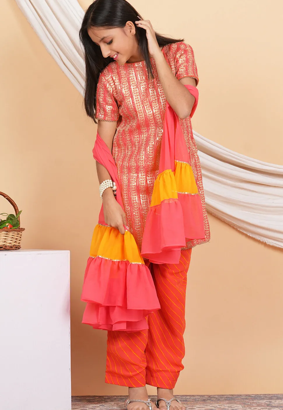 Leheriya Printed Georgette Pakistani Suit in Peach