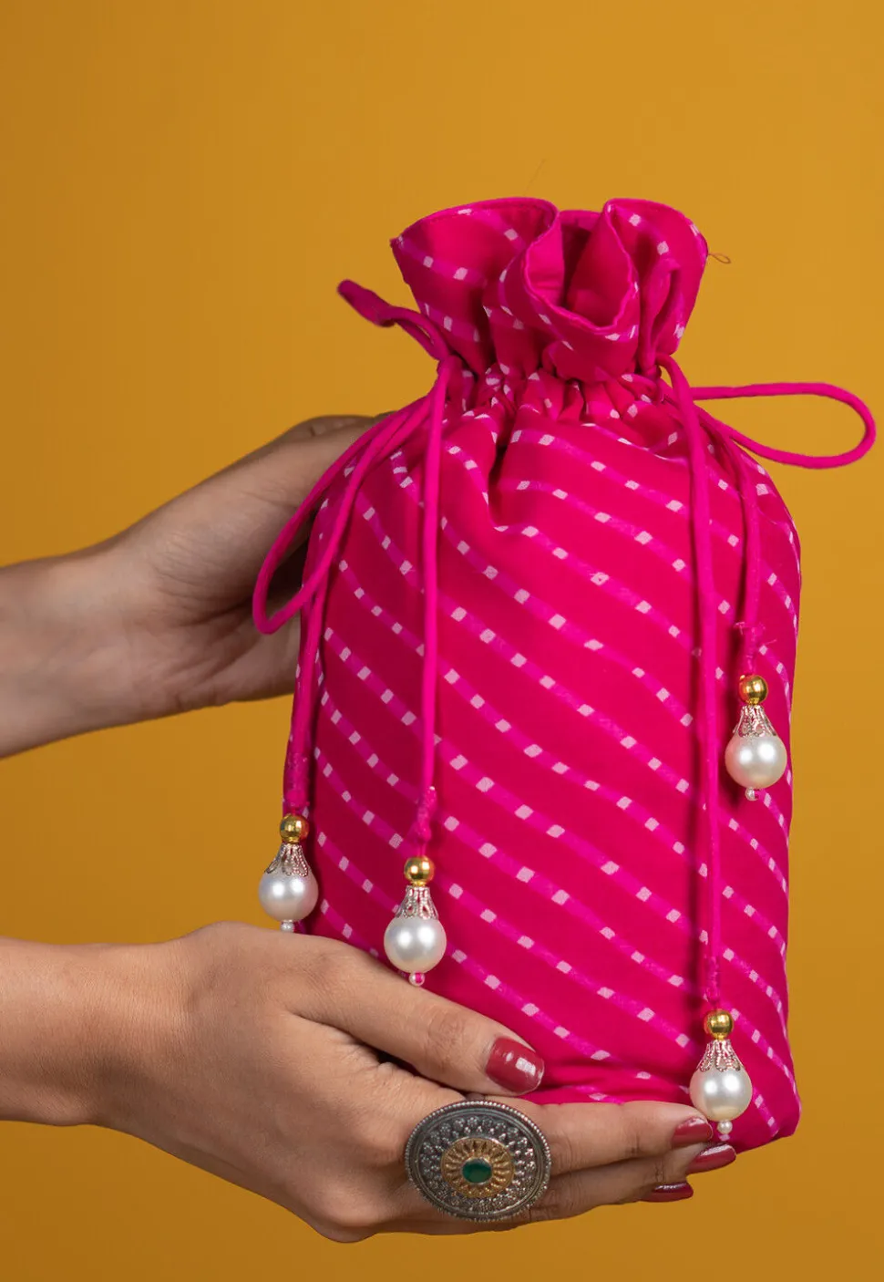 Leheriya Printed Georgette Potli Bag in Fuchsia