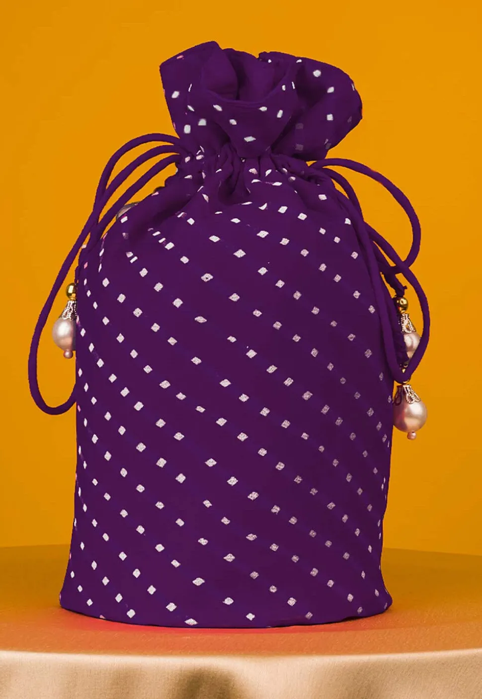 Leheriya Printed Georgette Potli Bag in Purple