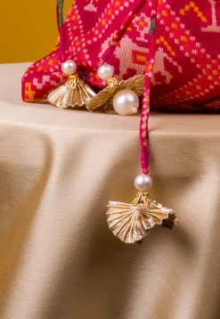 Patola Printed Kota Silk Potli Bag in Fuchsia