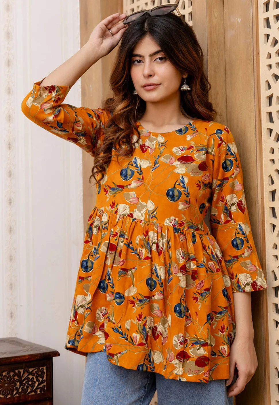 Printed Viscose Rayon A Line Kurti in Orange