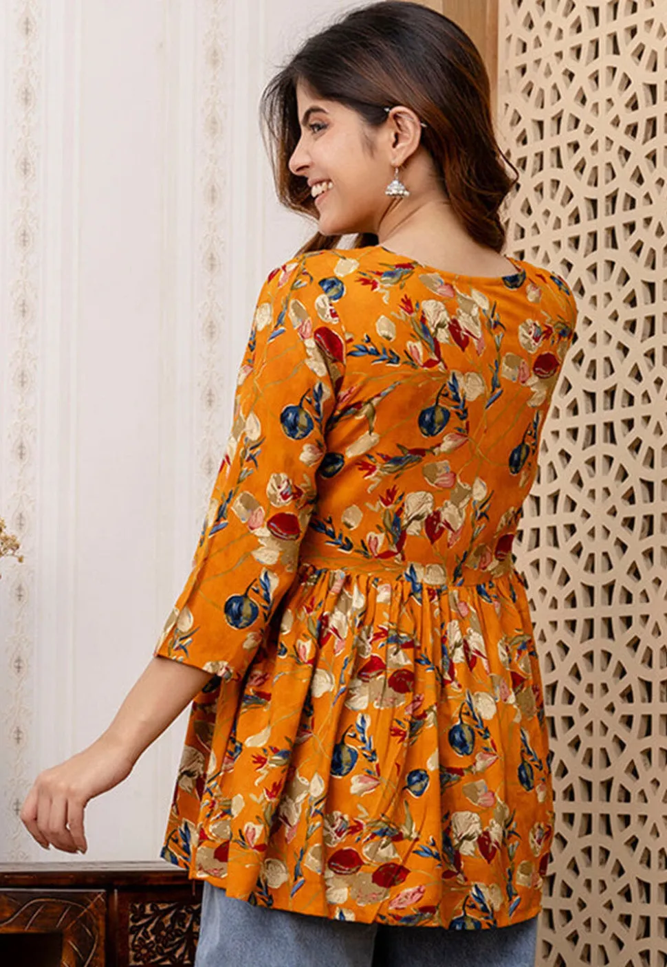 Printed Viscose Rayon A Line Kurti in Orange