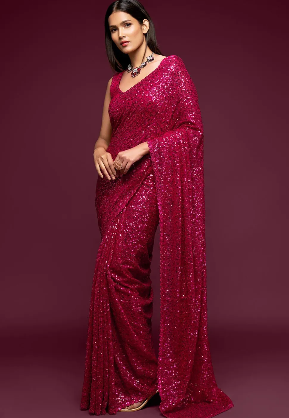 Sequinned Georgette Saree in Magenta