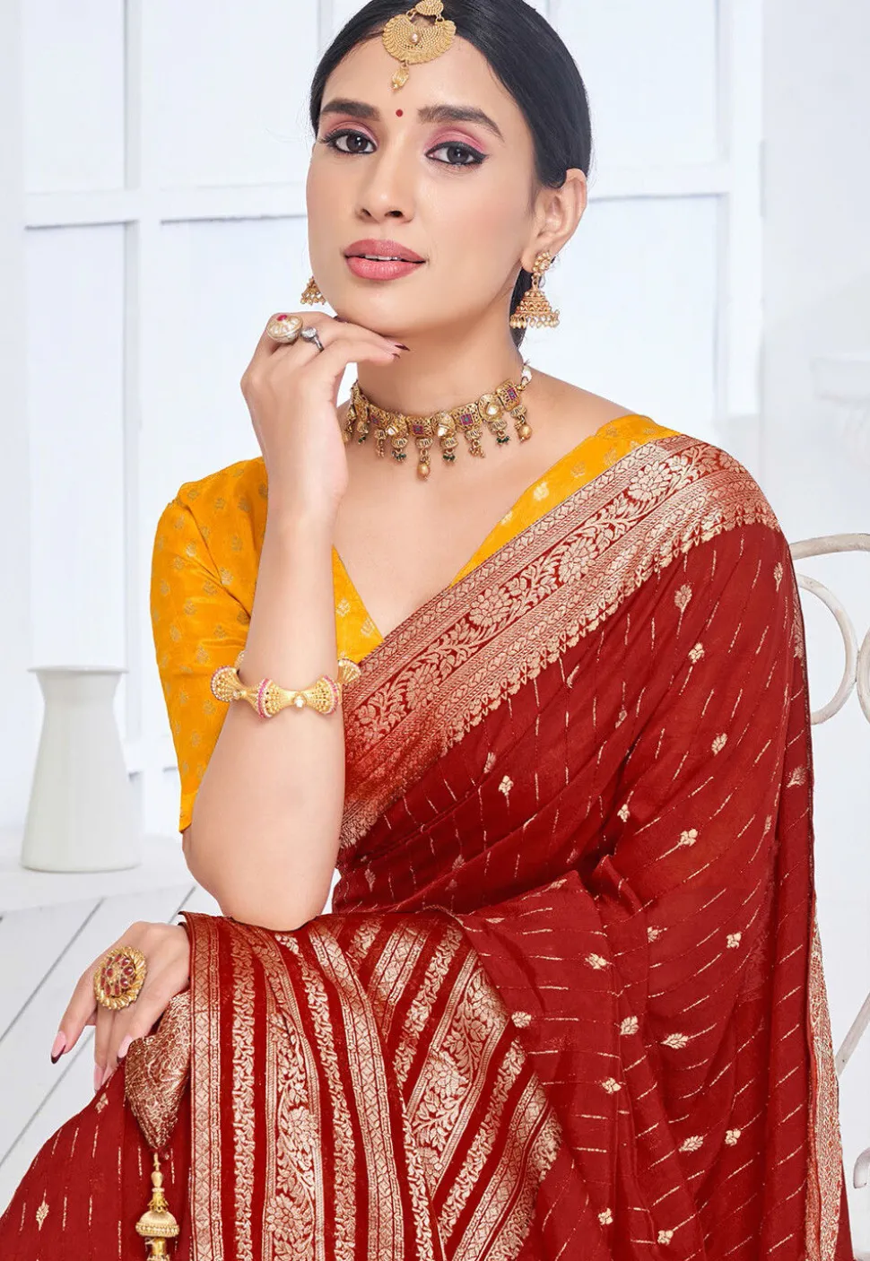 Woven Art Silk Saree in Maroon