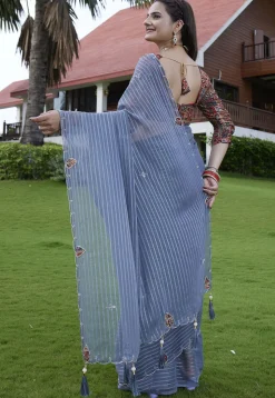 Woven Georgette Jacquard Scalloped Saree in Blue