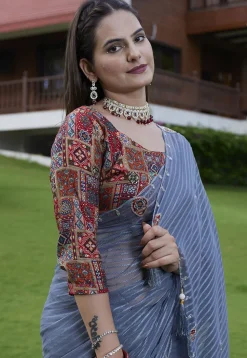 Woven Georgette Jacquard Scalloped Saree in Blue